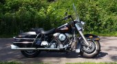 Harley-Davidson_FLHS_1340_Electra_Glide_Sport_%28reduced_effect%29_1992